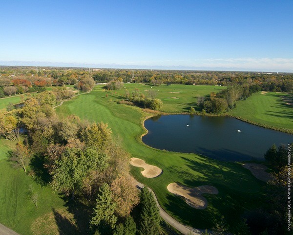 Aerial view of Hole 10 bordered by the lake on one side and trees on the other